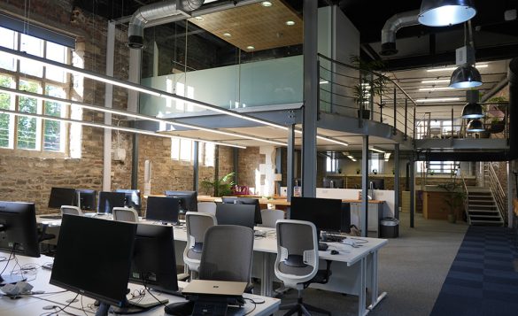 View of desk space and mezzanine floor in Engine Shed's flagship private office space